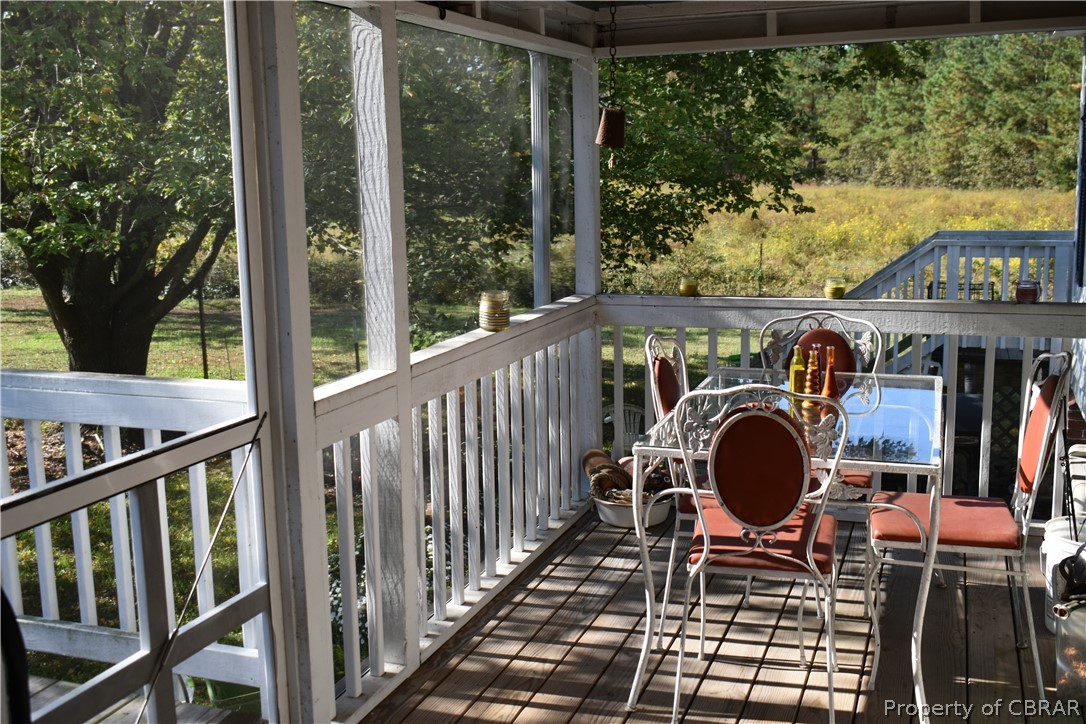 186 Aarons Bch Road Diggs, VA 23045 - Photo 9 of 40 Plenty of room in this screened in porch. Views over fenced paddock.