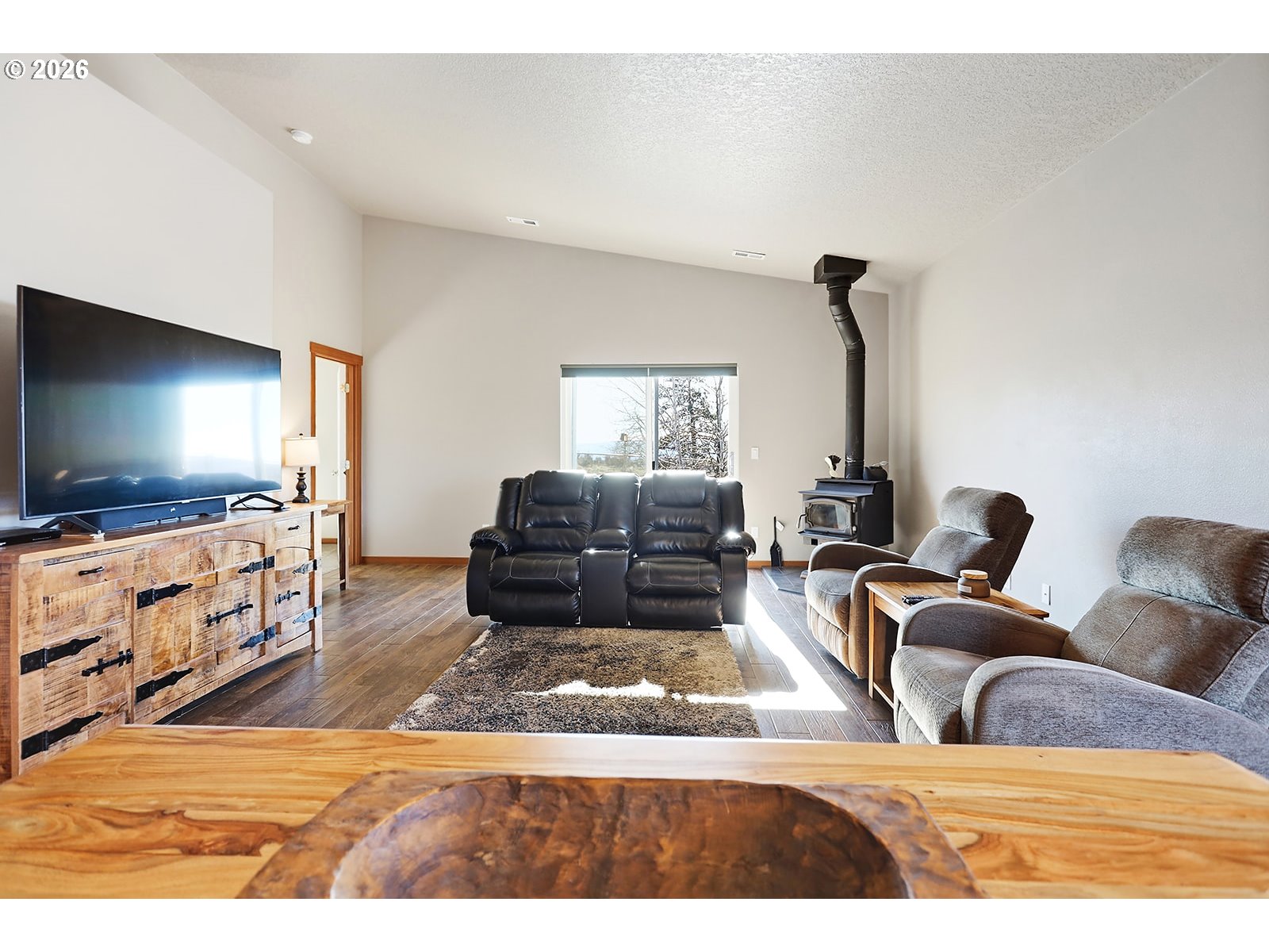 206 Old Mountain Road Goldendale, WA 98620 - Photo 17 of 46 a living room with furniture and a flat screen tv