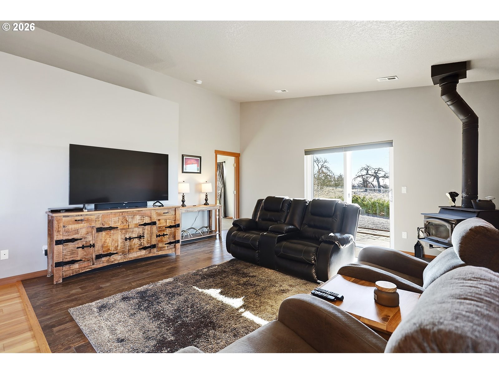 206 Old Mountain Road Goldendale, WA 98620 - Photo 18 of 46 a living room with furniture and a flat screen tv