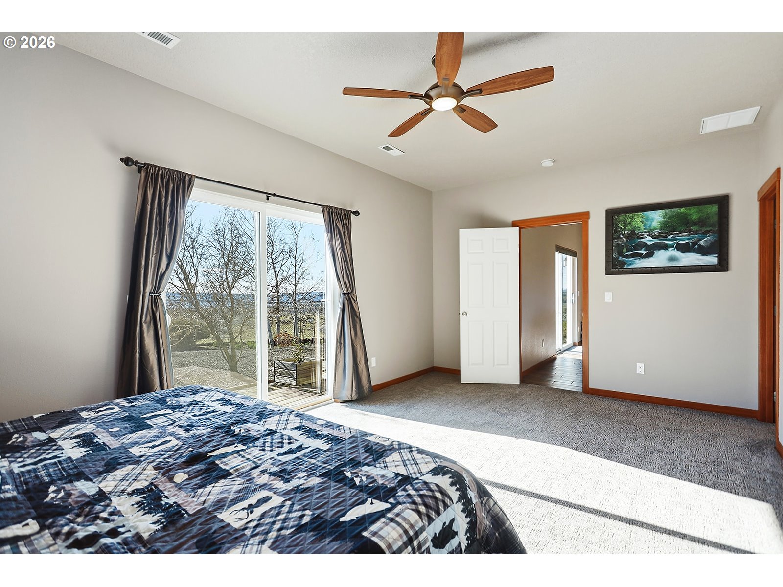 206 Old Mountain Road Goldendale, WA 98620 - Photo 21 of 46 a bedroom with a bed and a large window