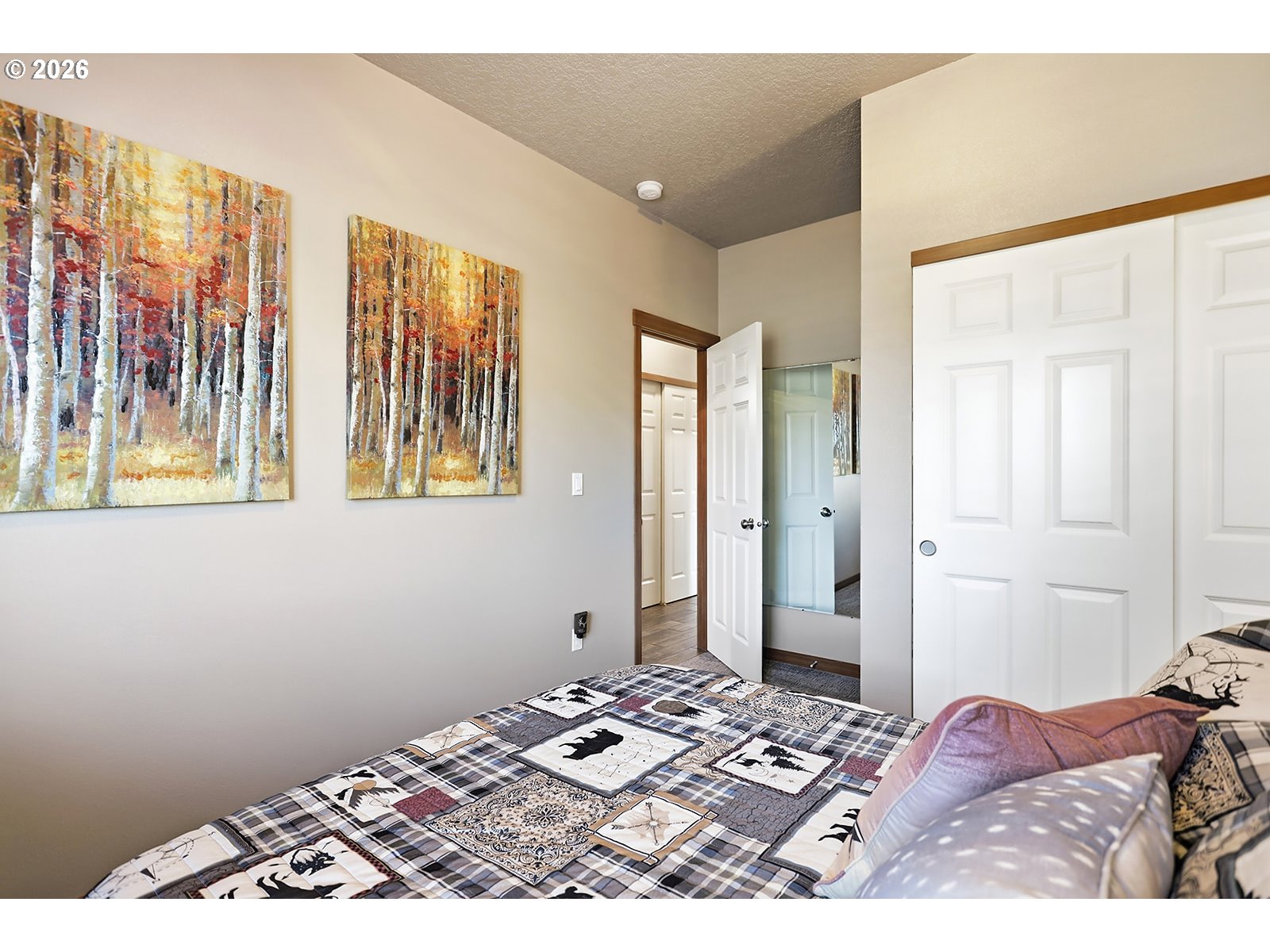 206 Old Mountain Road Goldendale, WA 98620 - Photo 27 of 46 a bedroom with a bed and a window