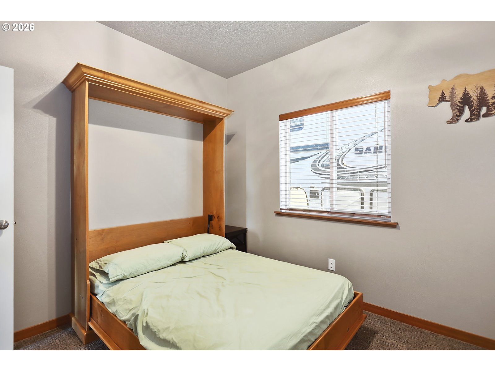 206 Old Mountain Road Goldendale, WA 98620 - Photo 31 of 46 a bedroom with a bed and a painting on the wall