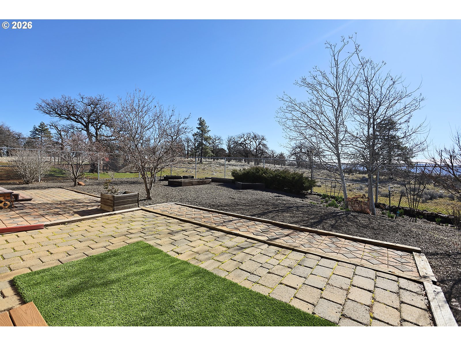 206 Old Mountain Road Goldendale, WA 98620 - Photo 45 of 46 a view of a yard with an trees