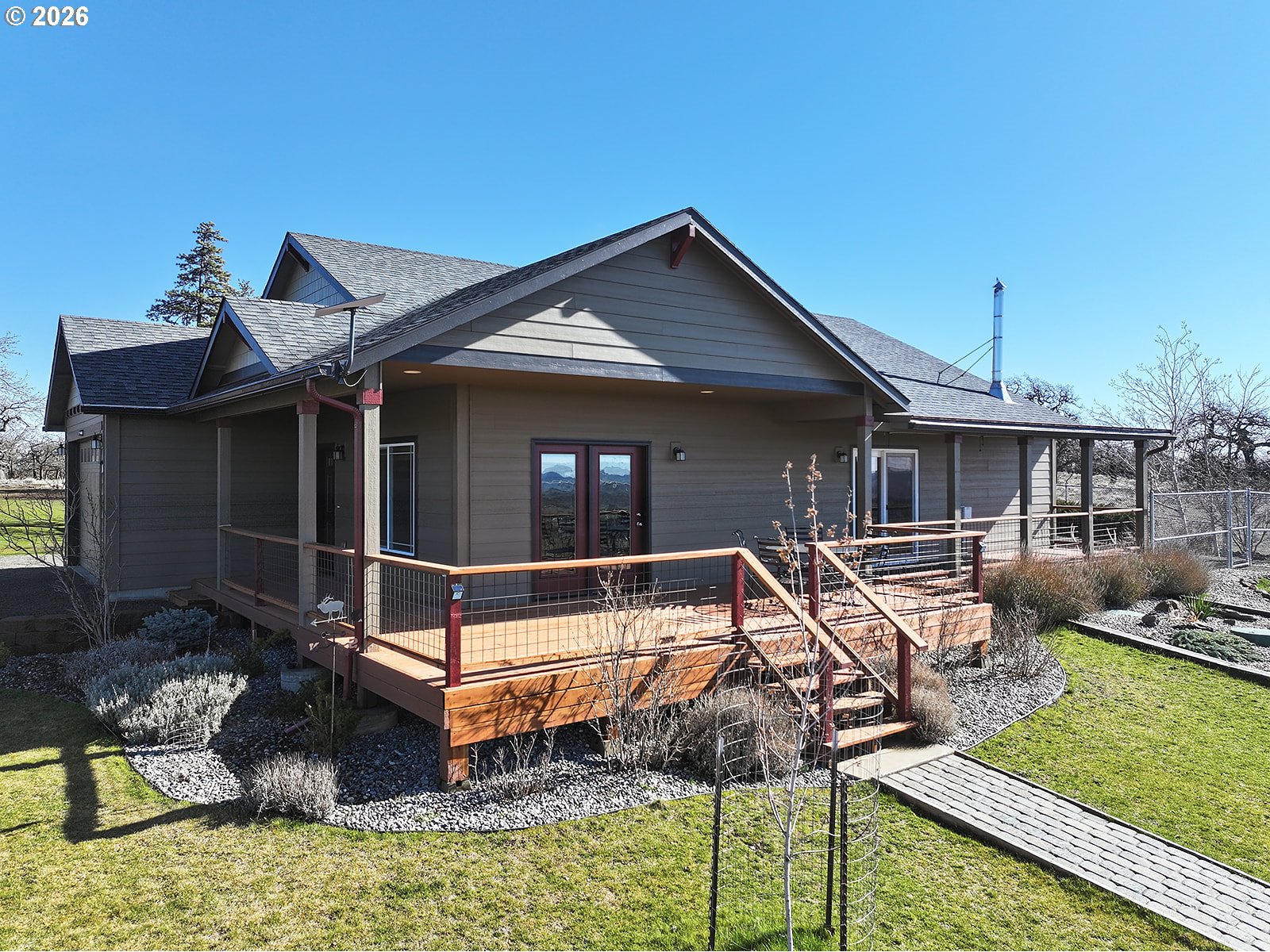 206 Old Mountain Road Goldendale, WA 98620 - Photo 5 of 46 a view of a house with backyard tub and sitting area