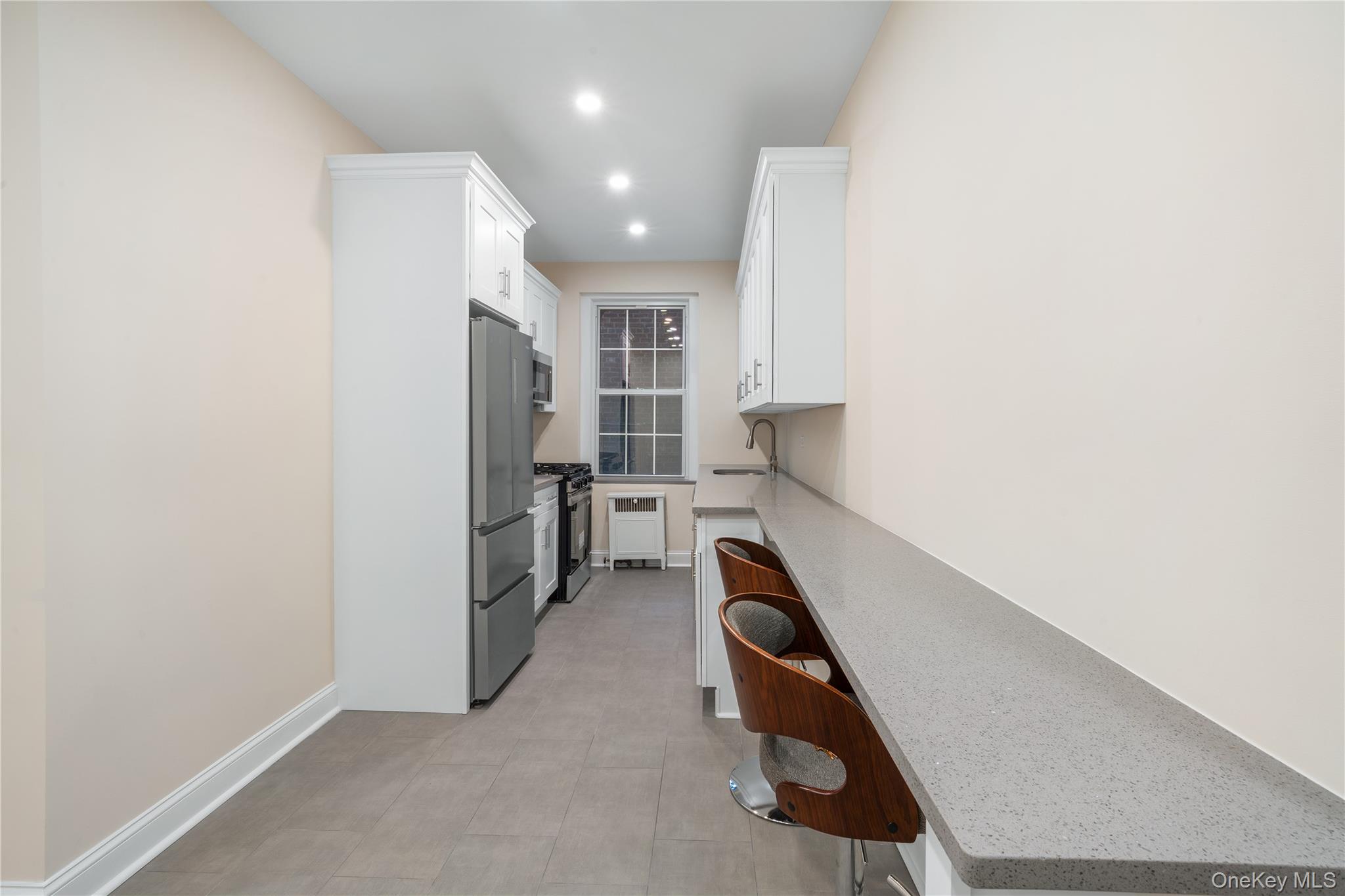 110-07 73rd Road, Unit 3K Queens, NY 11375 - Photo 11 of 21 a view of a room with gym equipment