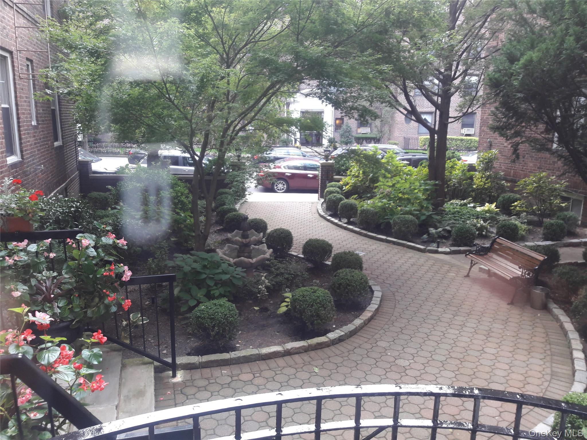 110-07 73rd Road, Unit 3K Queens, NY 11375 - Photo 21 of 21 a view of a house with a yard