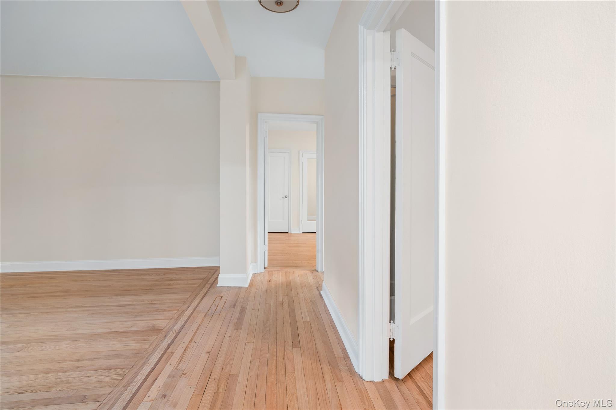 110-07 73rd Road, Unit 3K Queens, NY 11375 - Photo 6 of 21 a view of a room with wooden floor