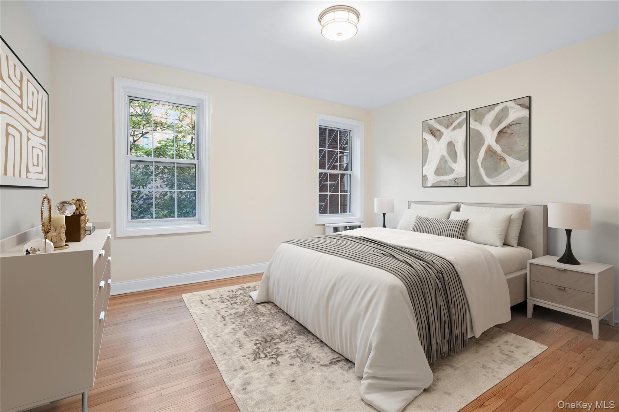 110-07 73rd Road, Unit 3K Queens, NY 11375 - Photo 7 of 21 a bedroom with bed and window