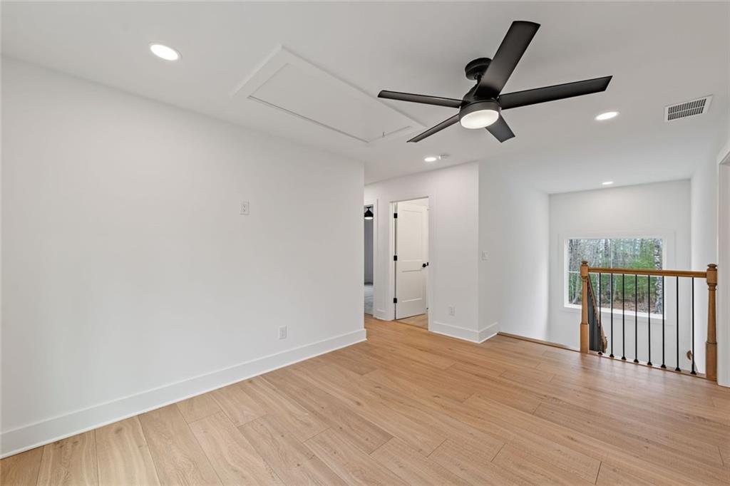 56 Running Brooke Court Morganton, GA 30560 - Photo 28 of 46 an empty room with wooden floor and windows