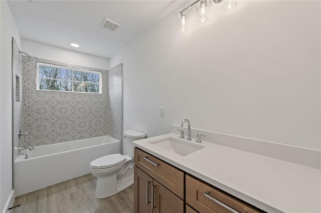 56 Running Brooke Court Morganton, GA 30560 - Photo 43 of 46 a bathroom with a sink a toilet and shower