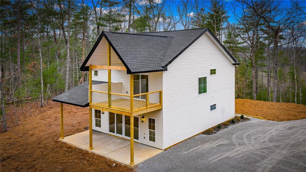 56 Running Brooke Court Morganton, GA 30560 - Photo 6 of 46 a view of a house with backyard and plants