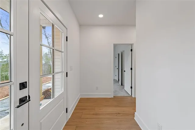 a view of a kitchen with a sink and cabinets
