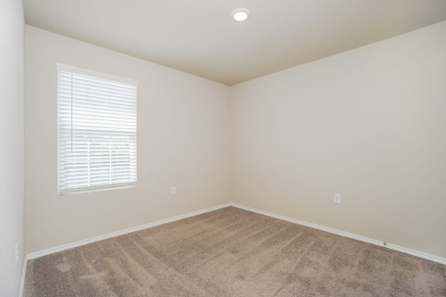 703 Vermilion San Antonio, TX 78221 - Photo 11 of 15 an empty room with a window