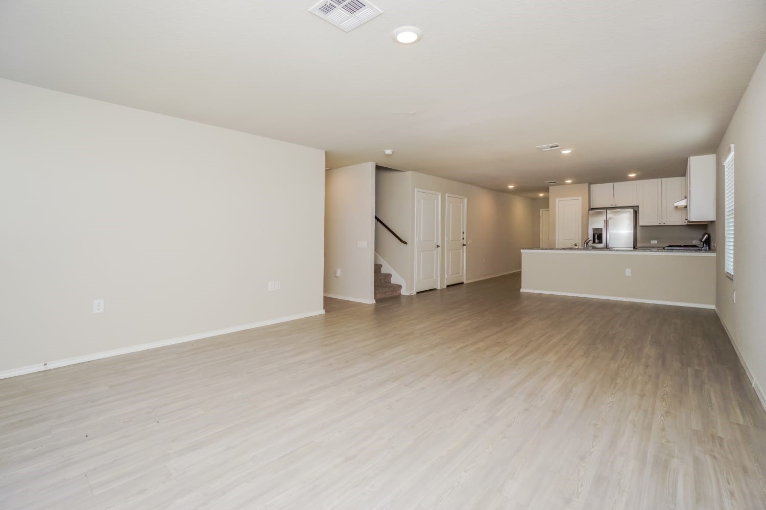 703 Vermilion San Antonio, TX 78221 - Photo 5 of 15 a view of a kitchen with a sink and a refrigerator