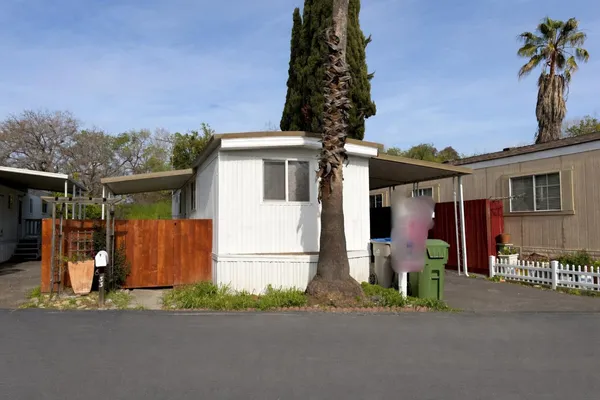front view of a house with a street