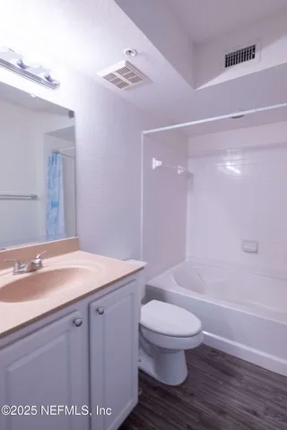 a view of a room with racks on the wall