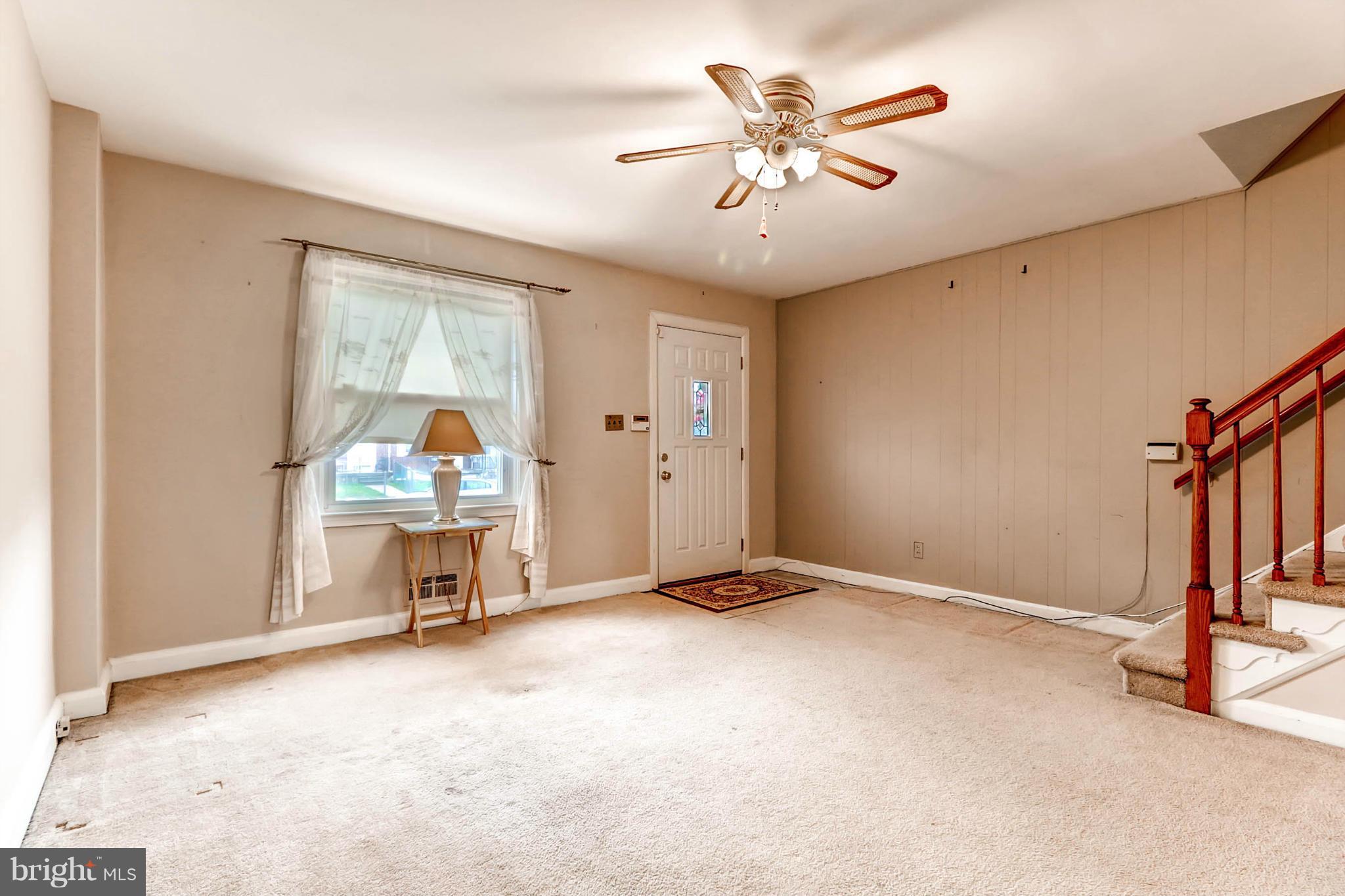 2102 Redthorn Road Baltimore, MD 21220 - Photo 12 of 30 an empty room with closet and a chandelier fan
