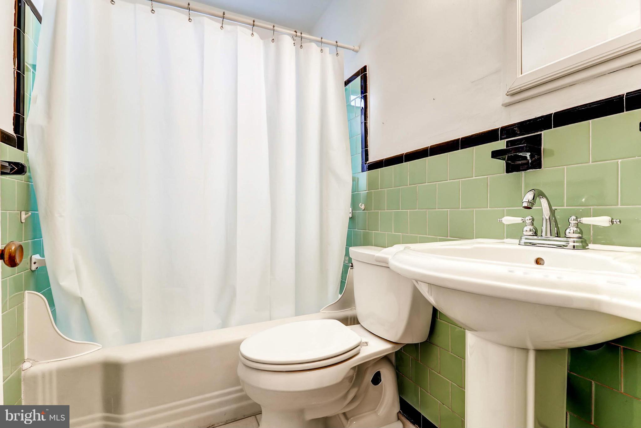 2102 Redthorn Road Baltimore, MD 21220 - Photo 15 of 30 a bathroom with a sink toilet and shower