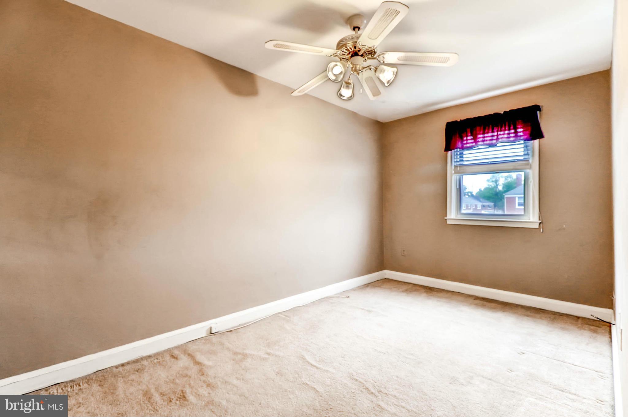 2102 Redthorn Road Baltimore, MD 21220 - Photo 18 of 30 a view of a big room with a fan