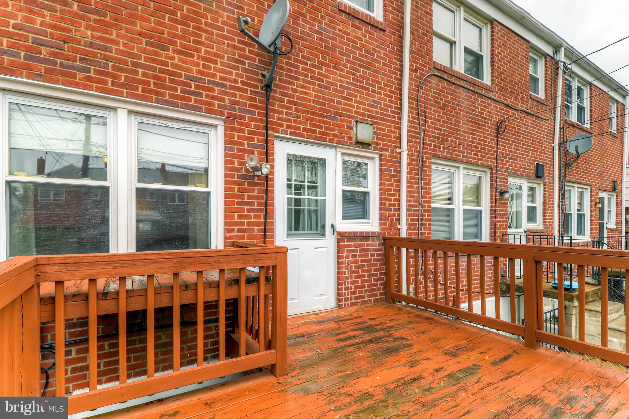 2102 Redthorn Road Baltimore, MD 21220 - Photo 26 of 30 a view of a brick building from a balcony