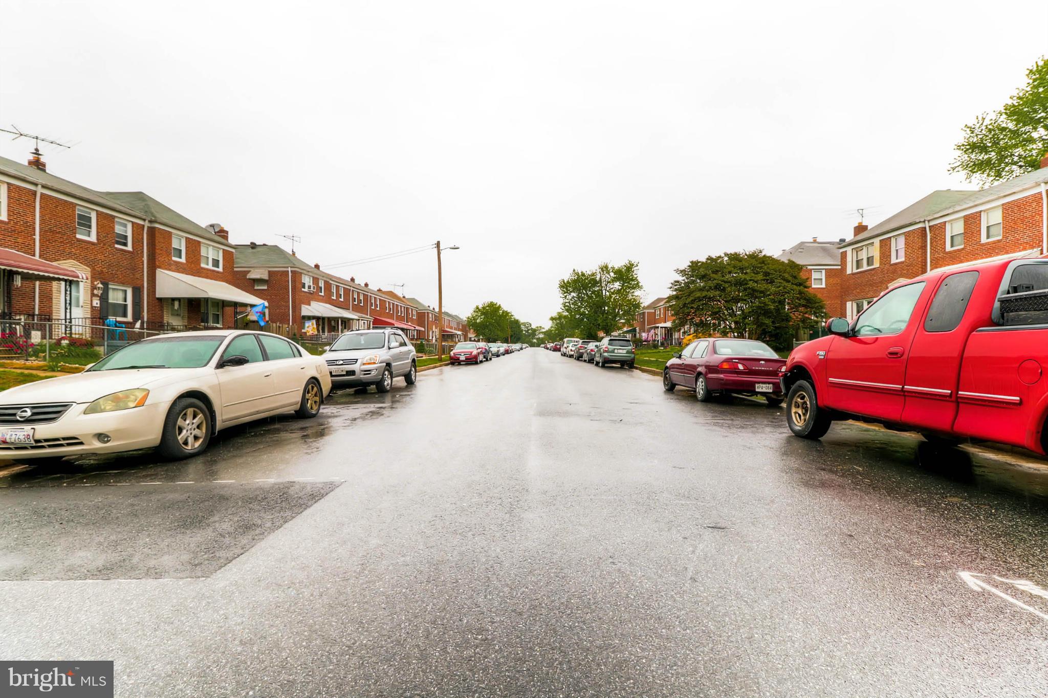 2102 Redthorn Road Baltimore, MD 21220 - Photo 29 of 30 a view of a cars parked in front of a building