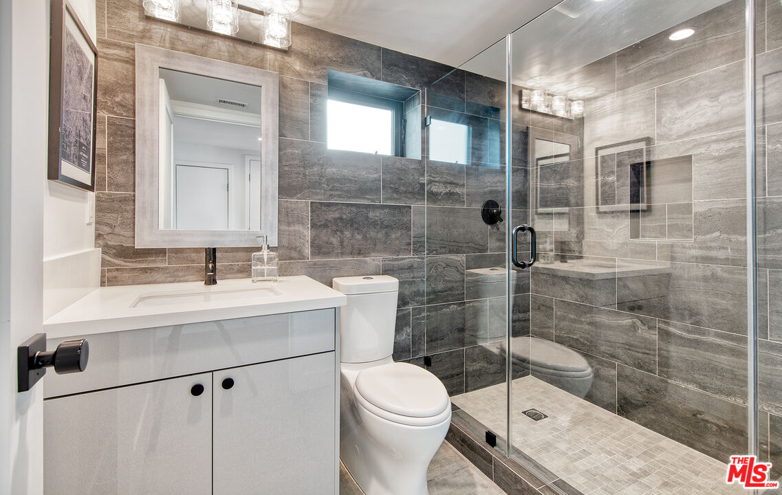 5317 Pacific Avenue Marina del Rey, CA 90292 - Photo 13 of 41 a bathroom with a sink toilet and shower