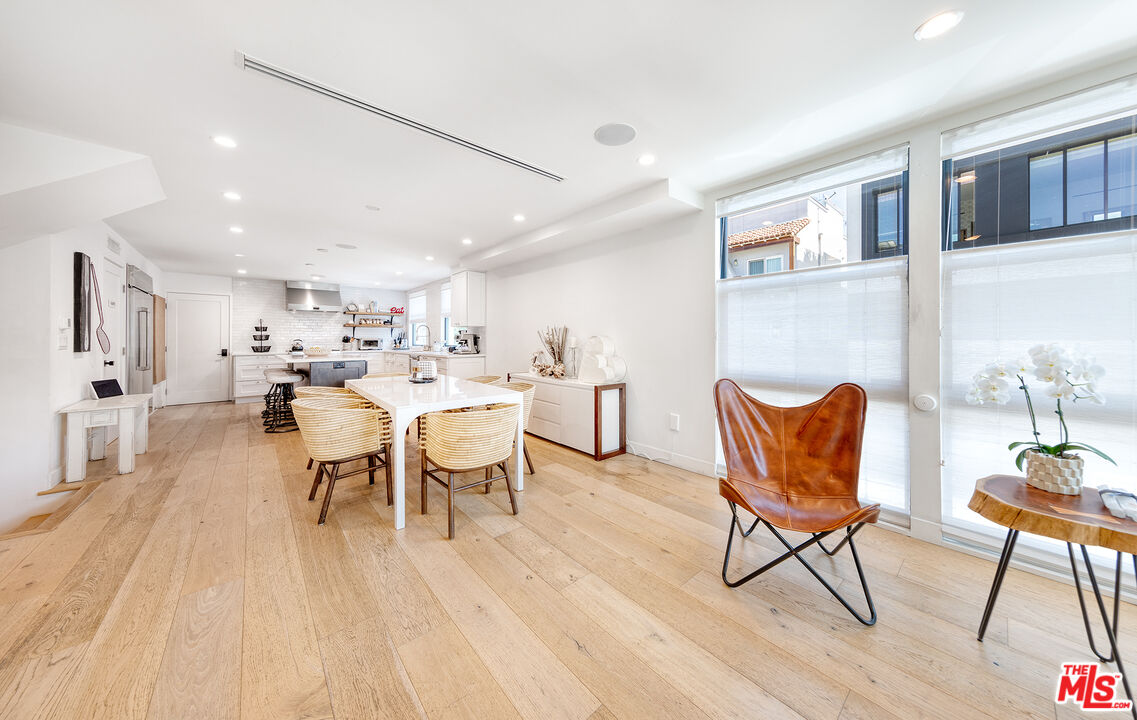 5317 Pacific Avenue Marina del Rey, CA 90292 - Photo 20 of 41 a view of a dining room with furniture and wooden floor