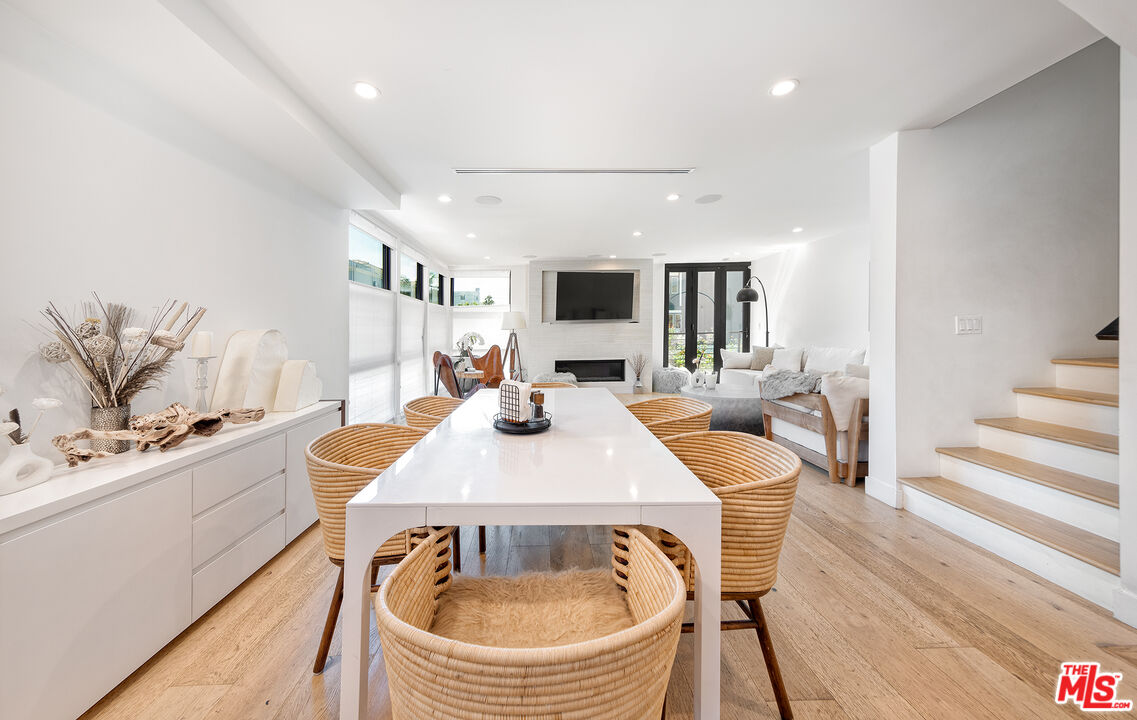 5317 Pacific Avenue Marina del Rey, CA 90292 - Photo 21 of 41 a view of a dining room with furniture and wooden floor