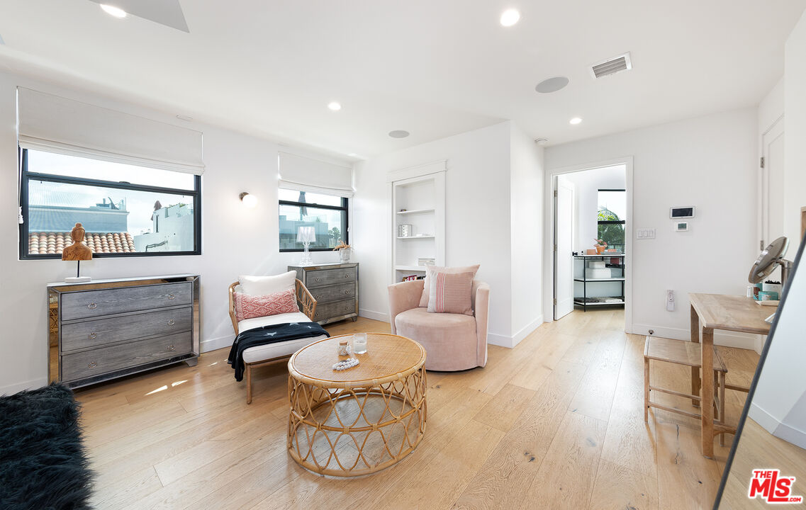 5317 Pacific Avenue Marina del Rey, CA 90292 - Photo 27 of 41 a living room with furniture and wooden floor