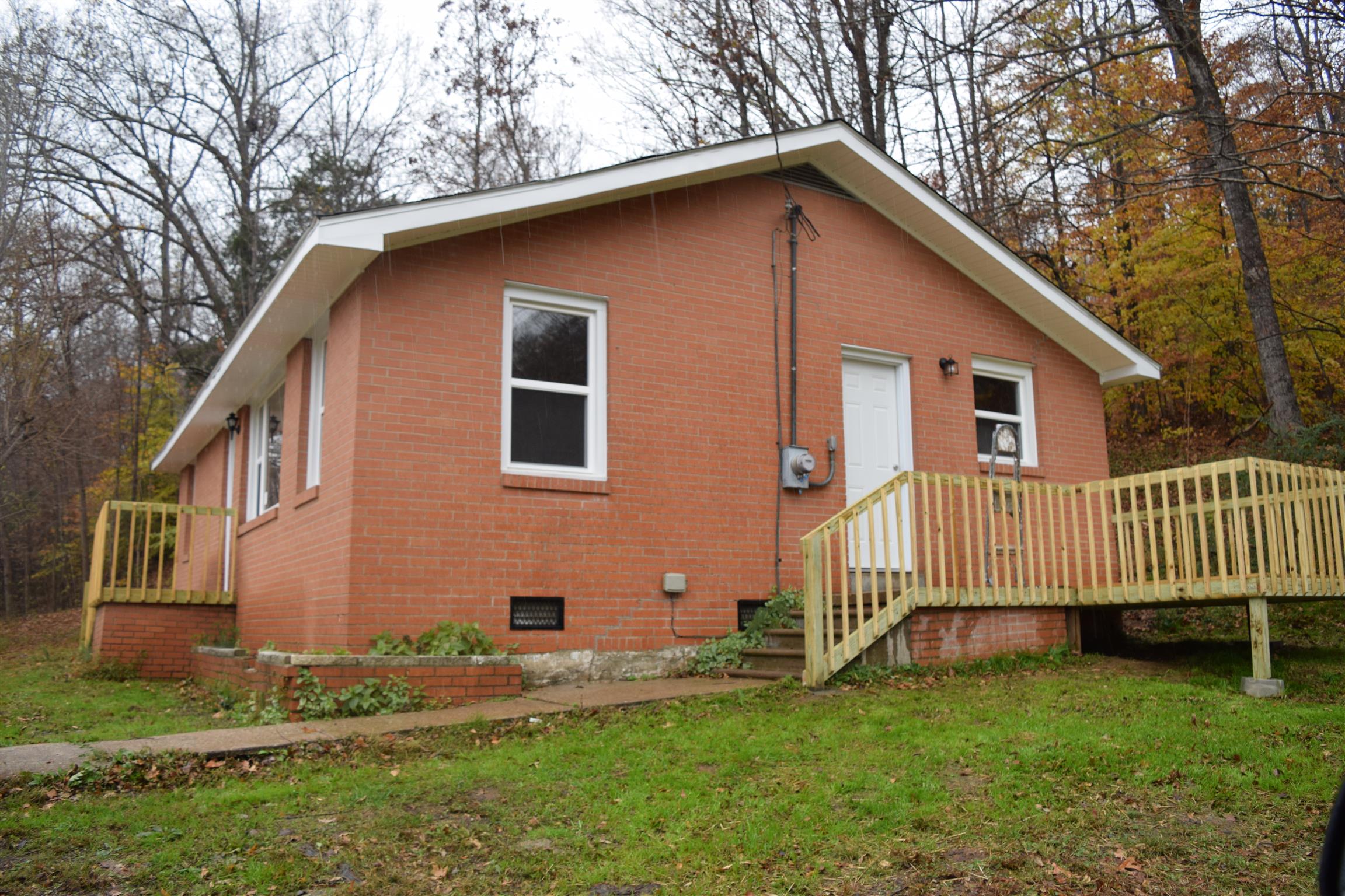 1960 Bumpus Mills Road Dover, TN 37058 - Photo 2 of 10 Enjoy your evenings out on this new deck looking up at the stars!