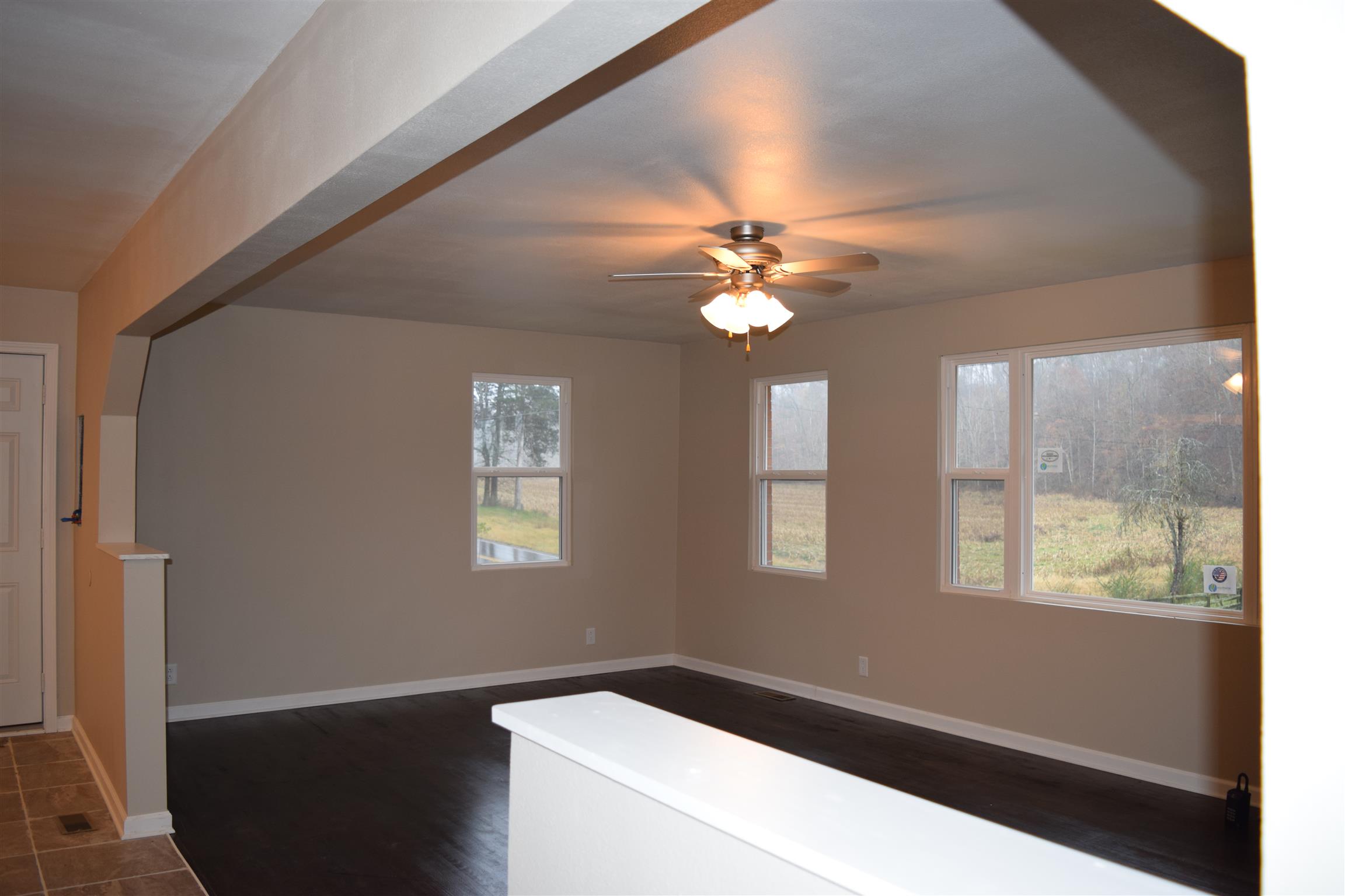 1960 Bumpus Mills Road Dover, TN 37058 - Photo 6 of 10 Windows, windows and more windows in this large living room.