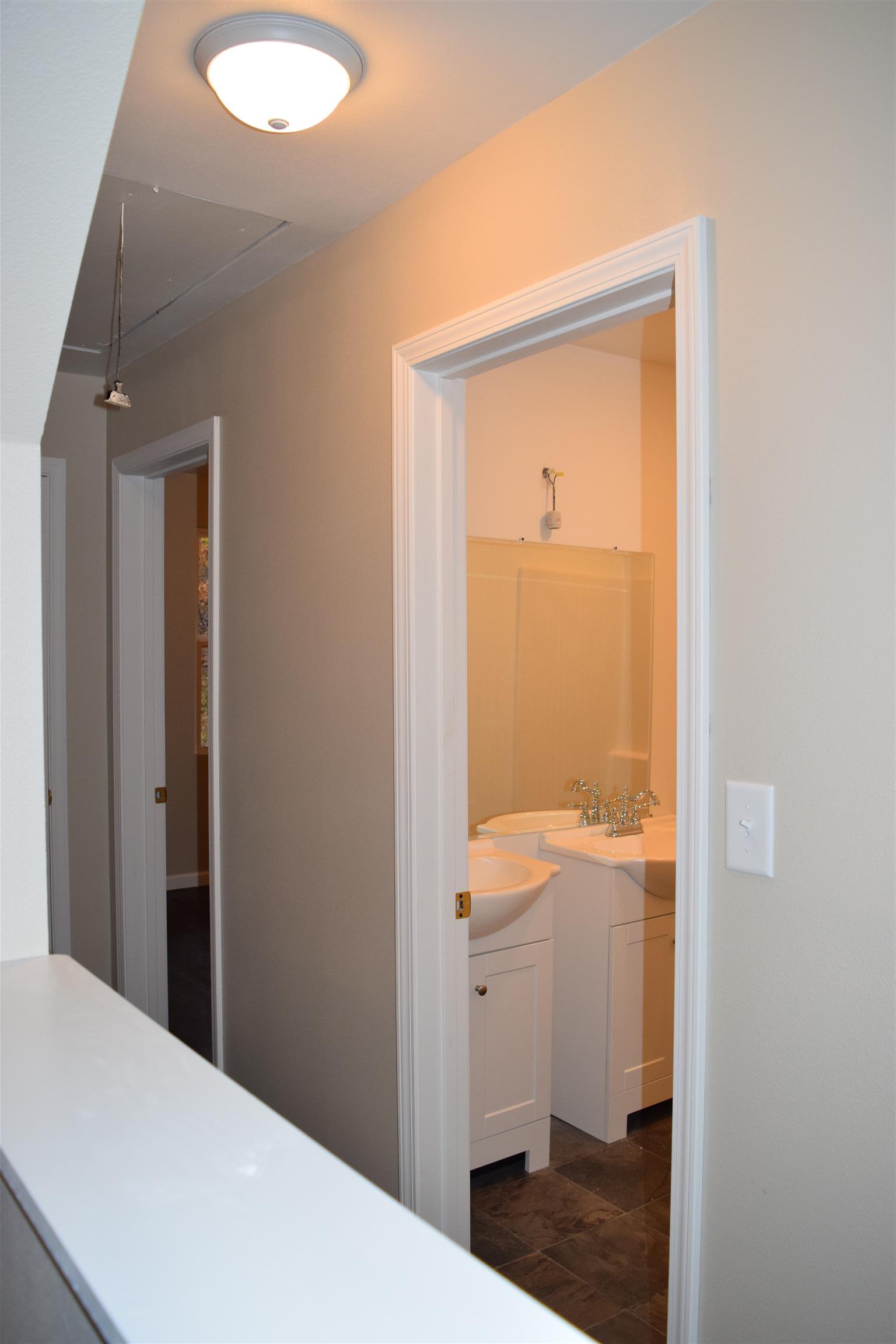 1960 Bumpus Mills Road Dover, TN 37058 - Photo 10 of 10 View down the hall and newly renovated bathroom on the right.