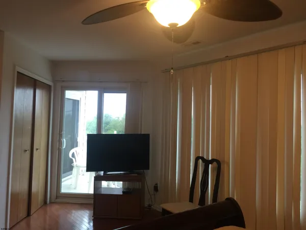 a view of a room with a hallway