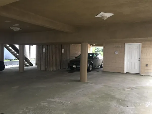 a view of a livingroom with furniture and a fireplace