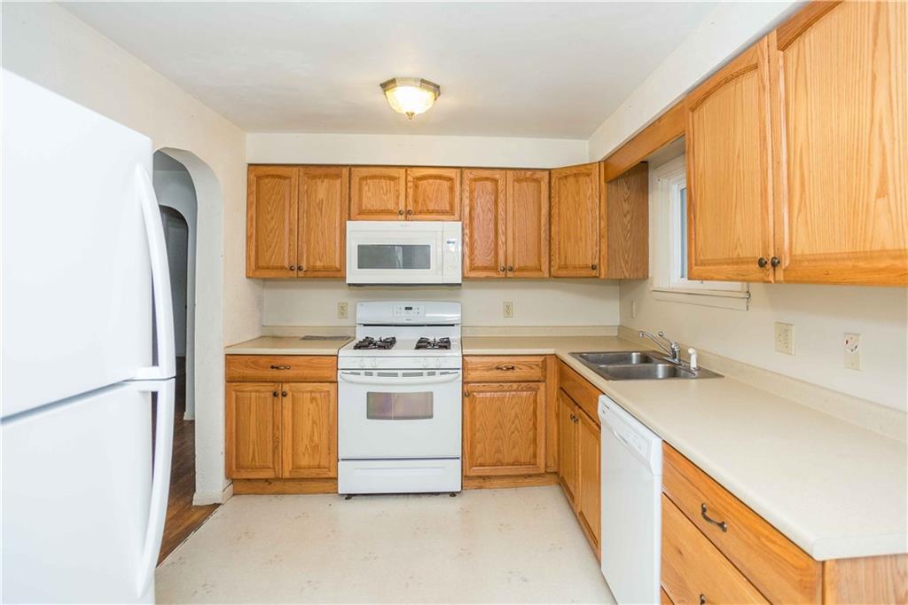 4335 West Pike Road Indiana, PA 15701 - Photo 15 of 37 a kitchen with stainless steel appliances a refrigerator sink and cabinets