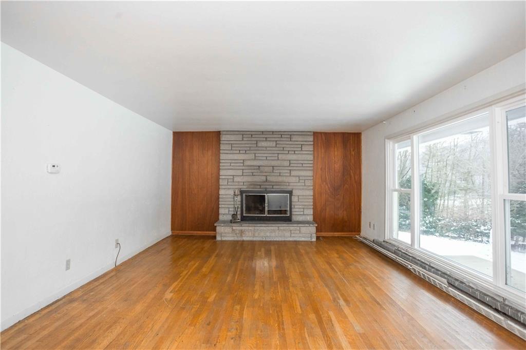 4335 West Pike Road Indiana, PA 15701 - Photo 20 of 37 a view of an empty room with a window and fire place