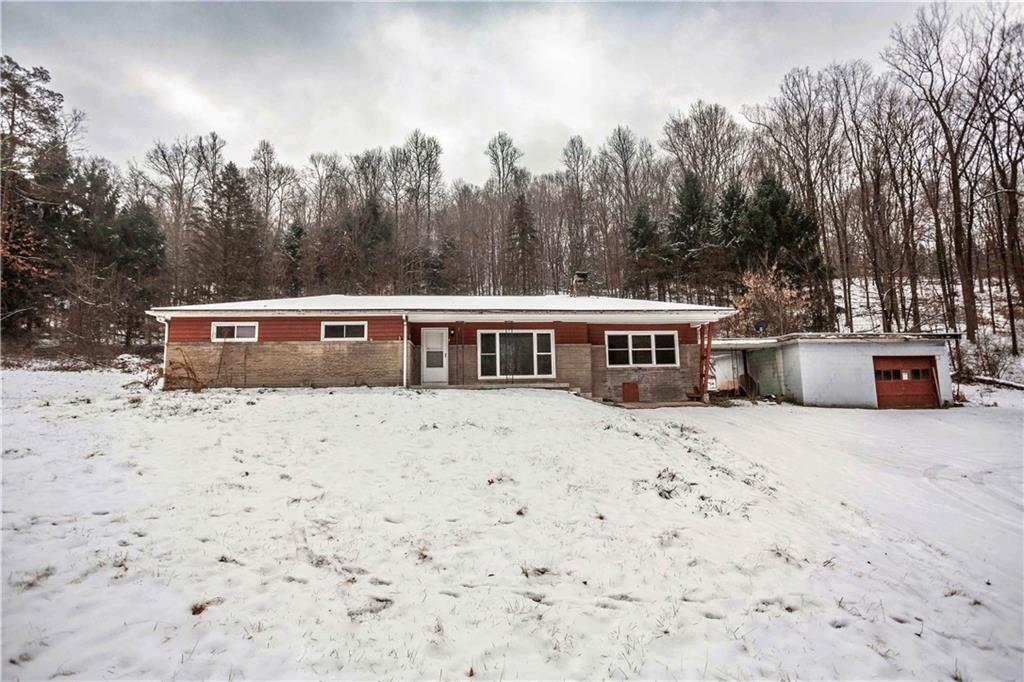 4335 West Pike Road Indiana, PA 15701 - Photo 2 of 37 a front view of a house with a yard