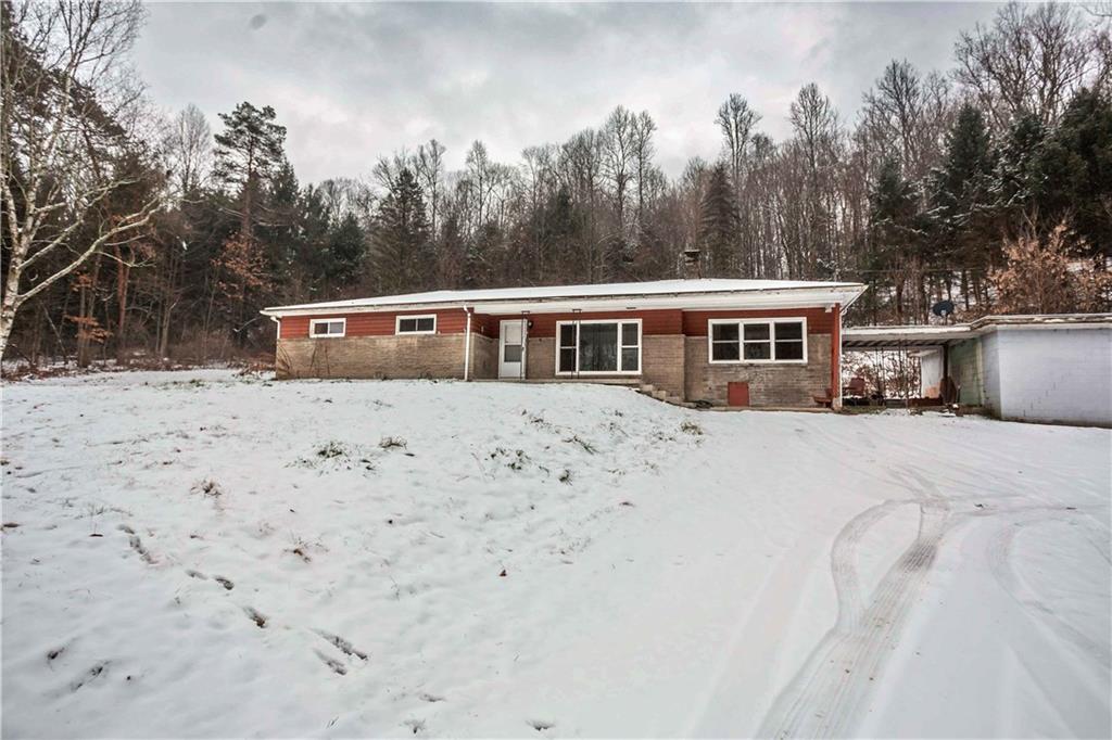 4335 West Pike Road Indiana, PA 15701 - Photo 3 of 37 a view of house with yard and trees in the background