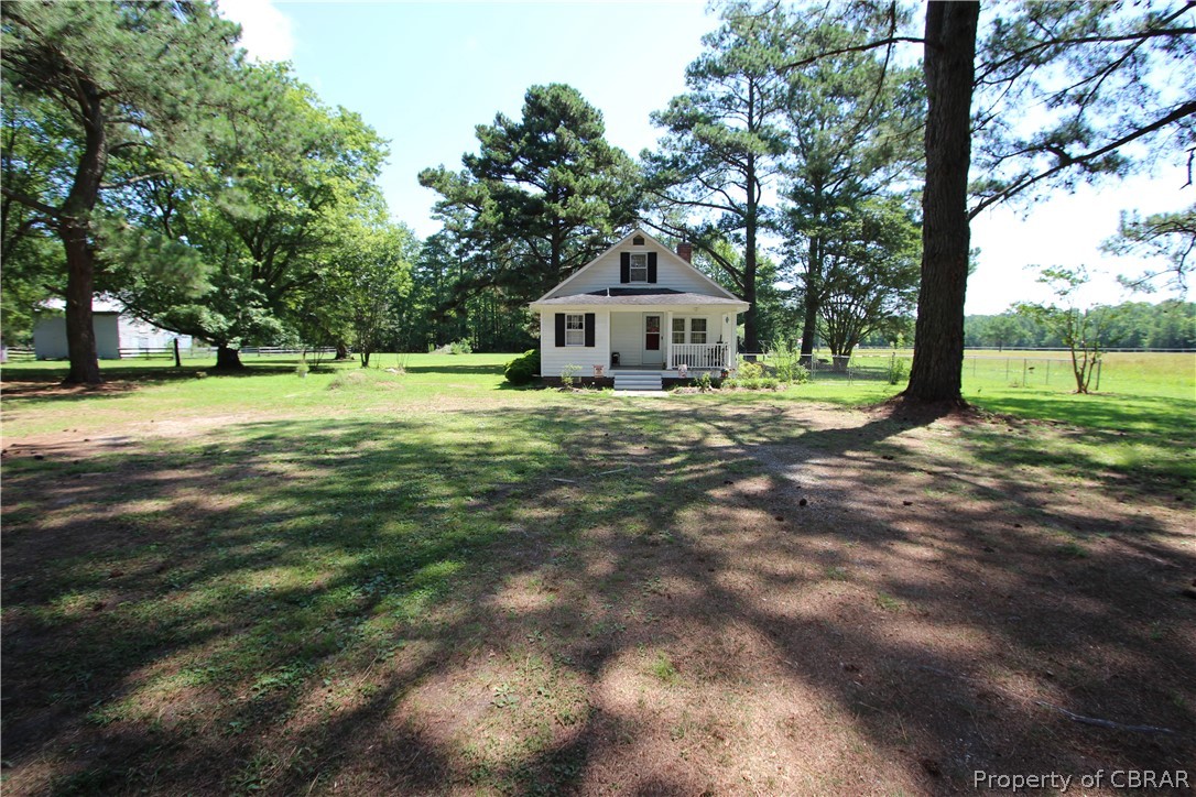 1247 Gdn Crk Road Mathews, VA 23109 - Photo 48 of 49 a house with trees in the background