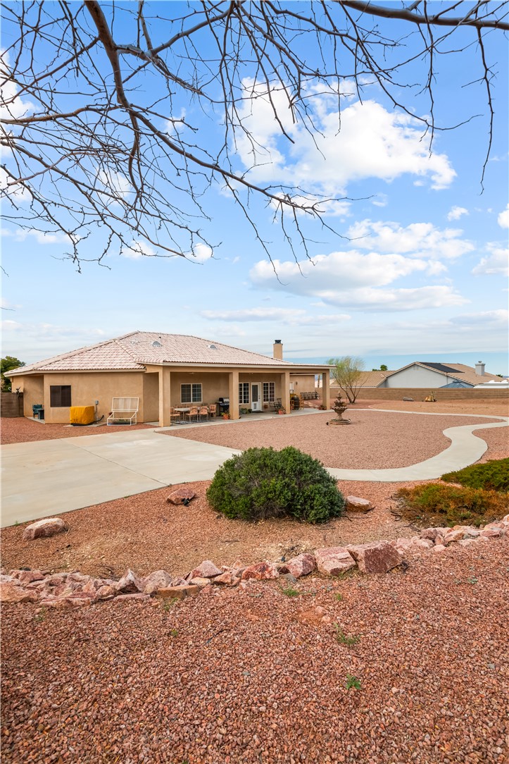 2898 Mountain Trail Road Kingman, AZ 86401 - Photo 68 of 75 a view of a big house with a yard