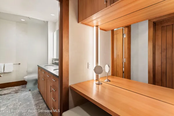 a room with a bed and a table