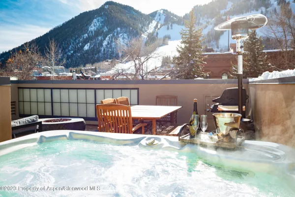 a view of swimming pool with a lounge chair