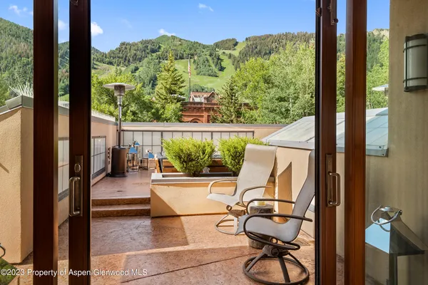 a view of swimming pool from a balcony