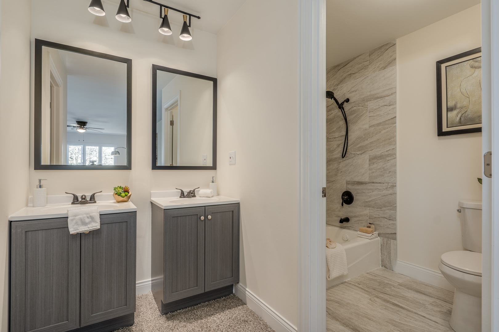 3664 Edward Drive Crete, IL 60417 - Photo 14 of 30 a bathroom with a toilet a sink and mirror