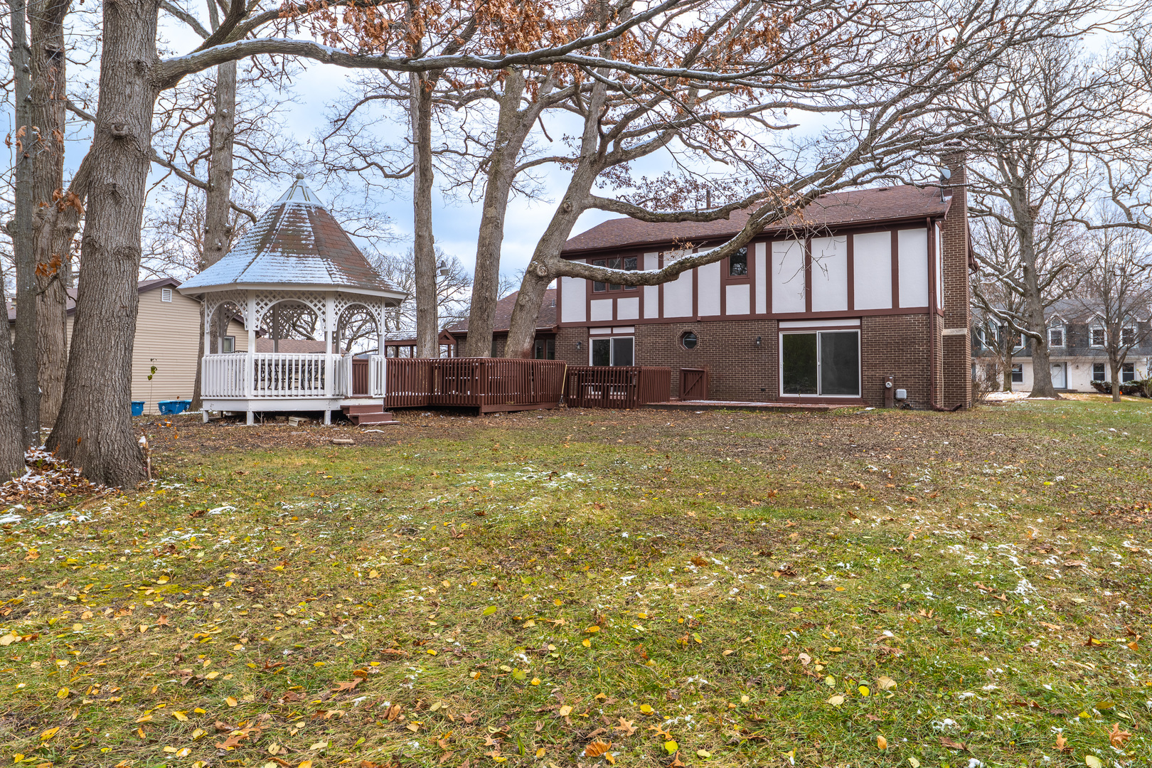 3664 Edward Drive Crete, IL 60417 - Photo 30 of 30 a front view of a house with a yard covered with trees