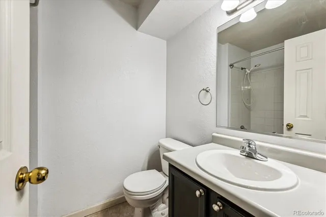 a bathroom with a sink and toilet