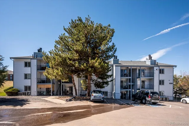 a view of a building with a street