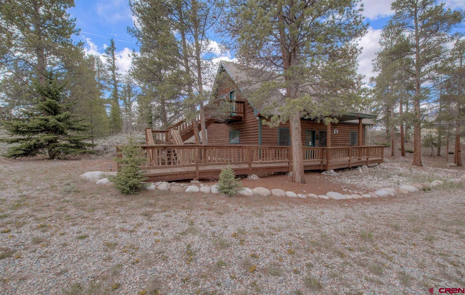 1499 Lake County Road Twin Lakes, CO 81251 - Photo 14 of 37 a view of a house with a yard covered in snow