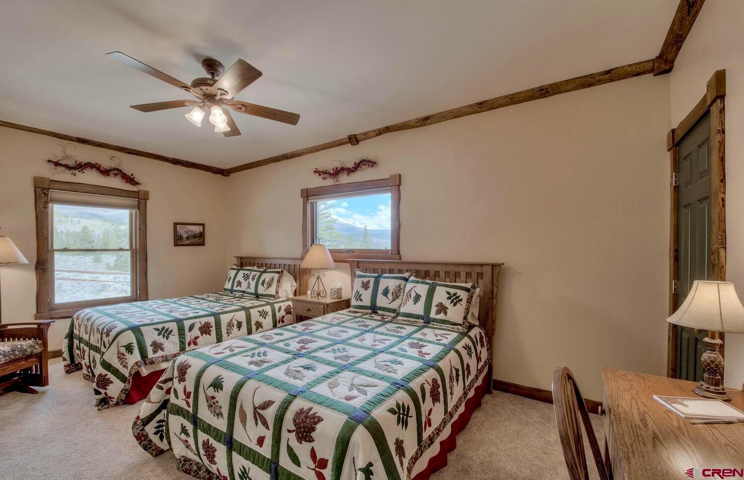 1499 Lake County Road Twin Lakes, CO 81251 - Photo 20 of 37 a bedroom with double bed and a window