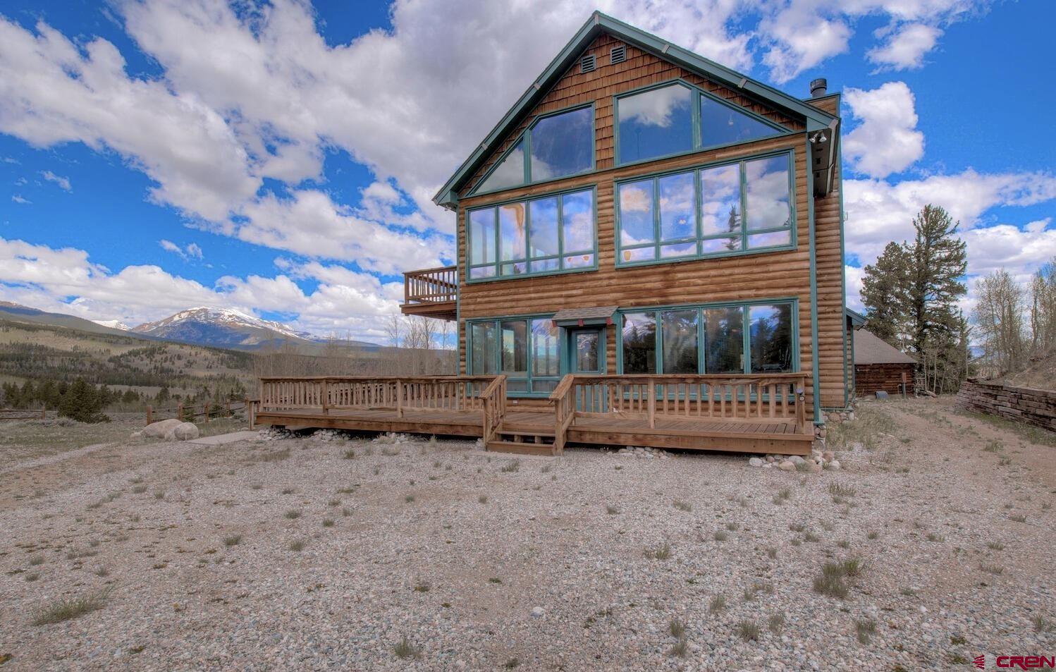 1499 Lake County Road Twin Lakes, CO 81251 - Photo 26 of 37 a view of a house with a yard and sitting area
